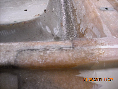 Underside bonded at L seat area.jpg and 